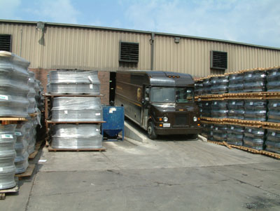 Courier shipping/receiving ramp